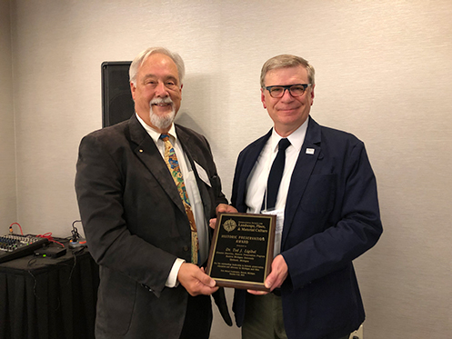 Dr. Ted J. Ligibel receiving the 2019 Historic Preservation Award