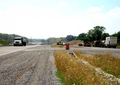 Figure 4. Construction crews work on a nearly-complete section of the U.S. 321 in Cocke County. Engineers designed the four-lane, divided roadway to handle 40,000 vehicles a day at high speeds. Current traffic rates are close to 4,000 cars per day. Photo by author, 2010.