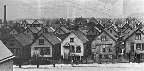 Figure 10. An unidentified Chicago neighborhood of wood-frame Worker Cottages, circa 1910 (Chicago Historical Society ICHi-00855, gift of United Charities, reprinted in Prosser 1981).
